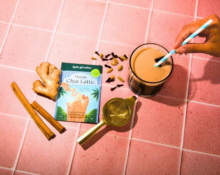 chai sachet with made cup and spices